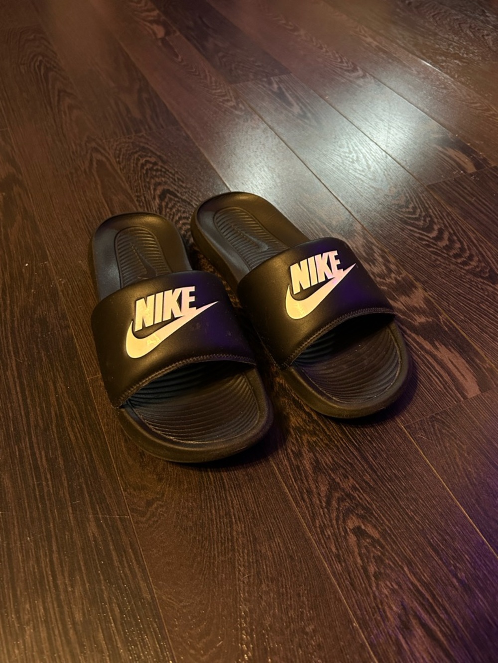 Nike Black Slides with White Swoosh Logo